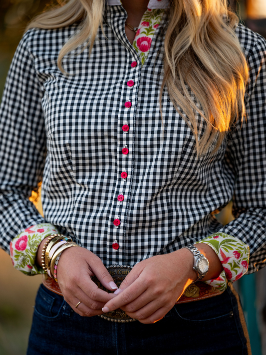 Close up of gingham check shirt with hummingbird damask accent print.