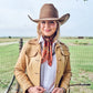 Happy Trails Wild Rag tied loosely at neckline over white shirt and tan fringe leather jacket with brown felt cowboy hat