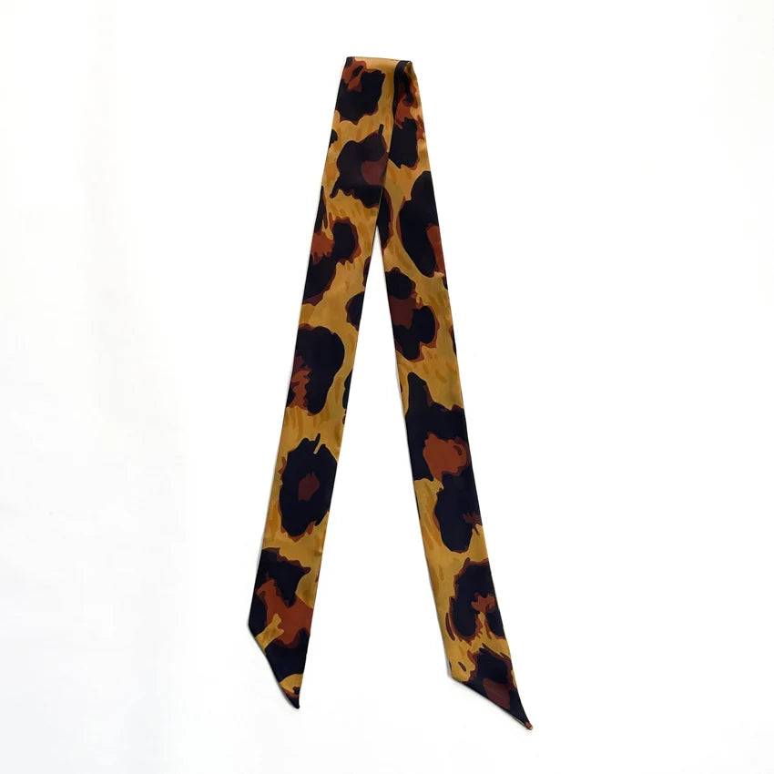 Leopard Twilly laid flat on white background showing full length warm-toned leopard print