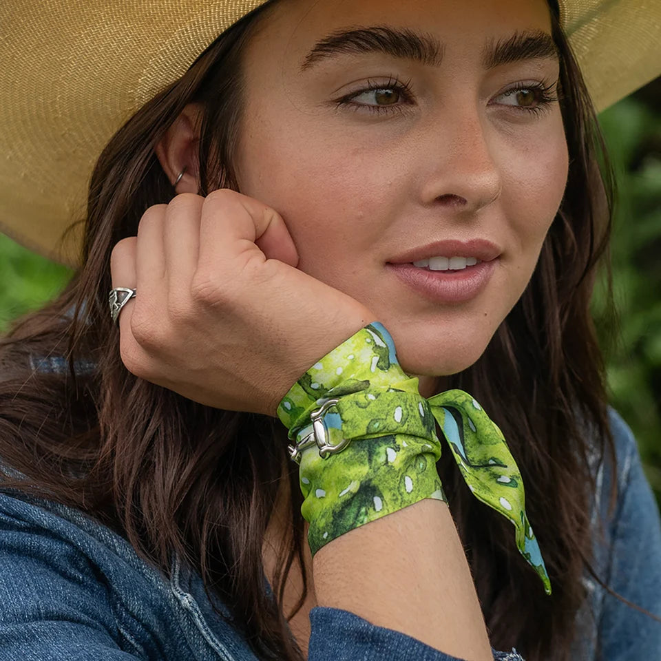 Prickly Pear Twilly wrapped around wrist close up showing vibrant green and turquoise prickly pear print