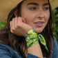Prickly Pear Twilly wrapped around wrist close up showing vibrant green and turquoise prickly pear print