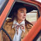 Sweetheart of the Rodeo Twilly in Tan tied in a bow at neckline, styled with fringe jacket