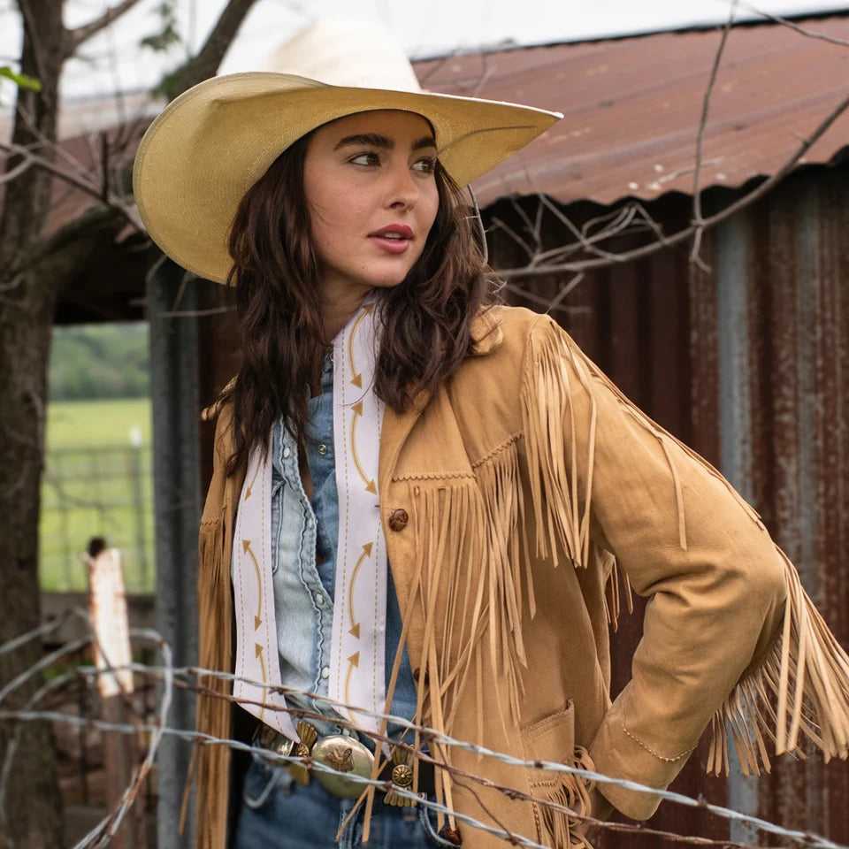 Smiley Pocket Twilly draped around neck over fringe suede jacket and denim shirt with straw cowboy hat