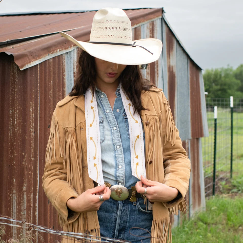 Smiley Pocket Twilly styled loose around neck over fringe suede jacket with concho belt and straw hat