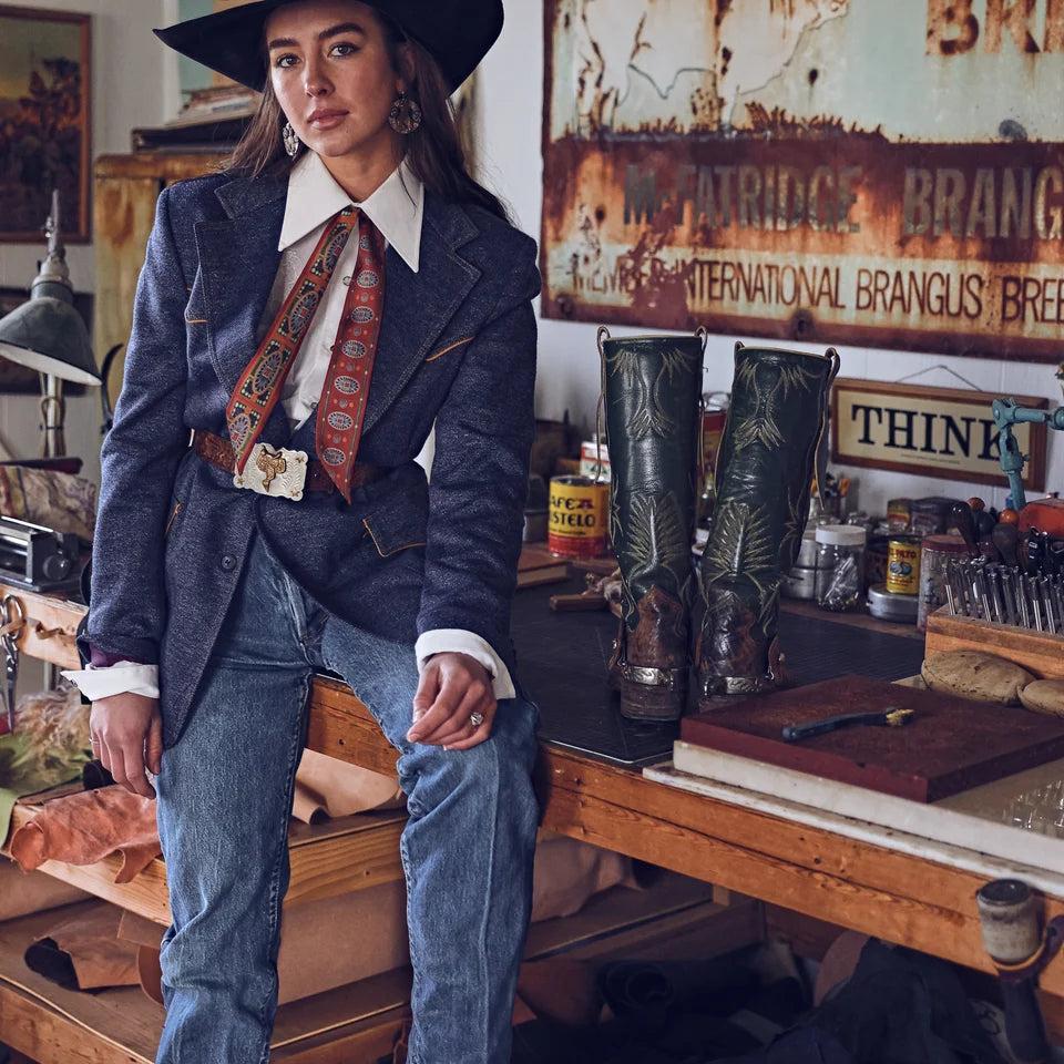 San Miguel Twilly draped over shoulders styled with denim blazer and western accessories