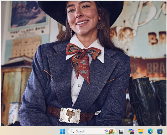 San Miguel Twilly styled around neck in a bow with denim blazer and western belt