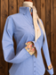 Blue western shirt styled with a cream wild rag